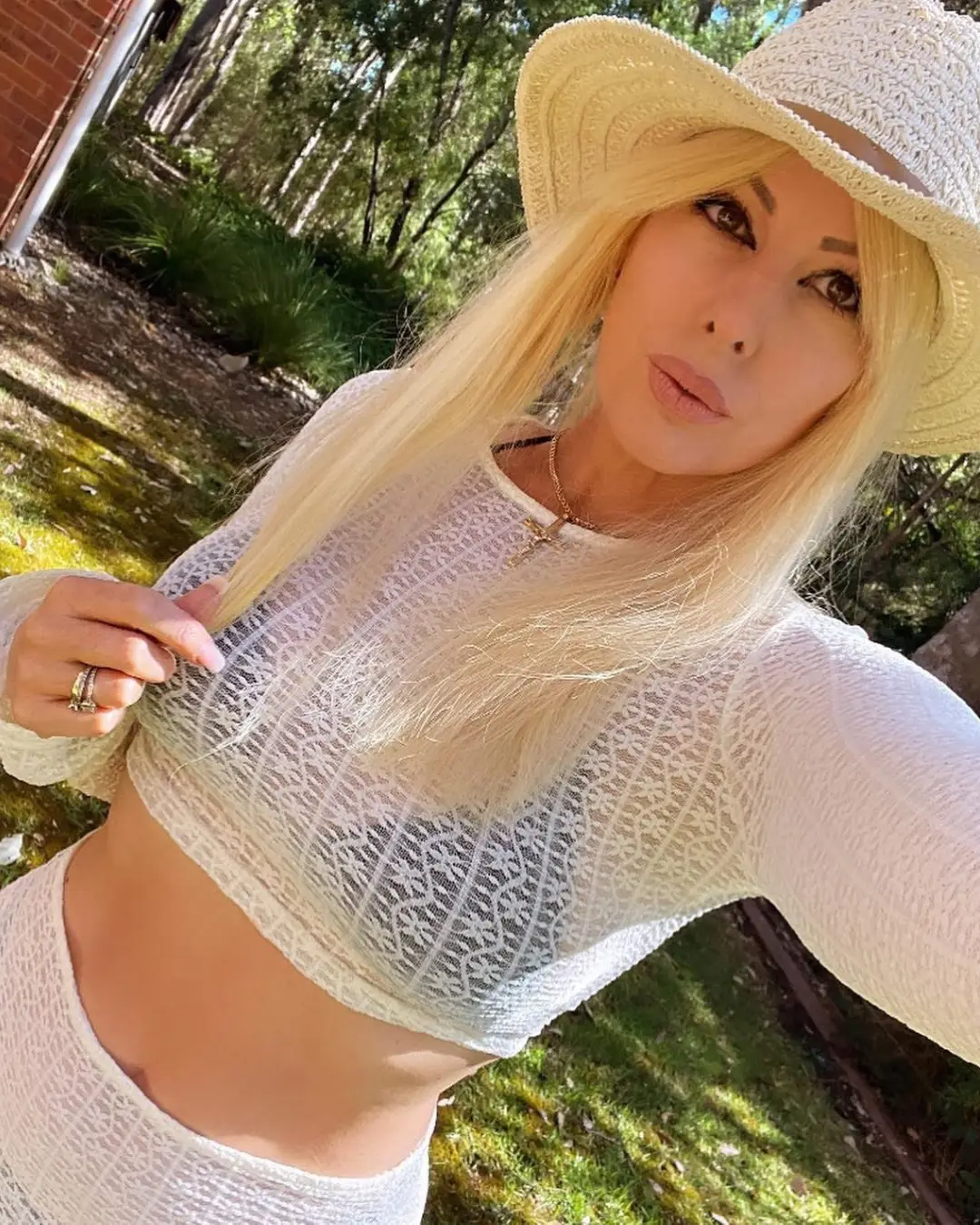 Savannah in a white outfit